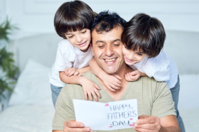 dad with two sons and fathers day card