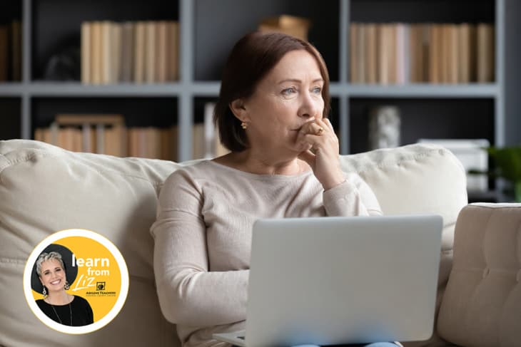 sad woman sitting on couch