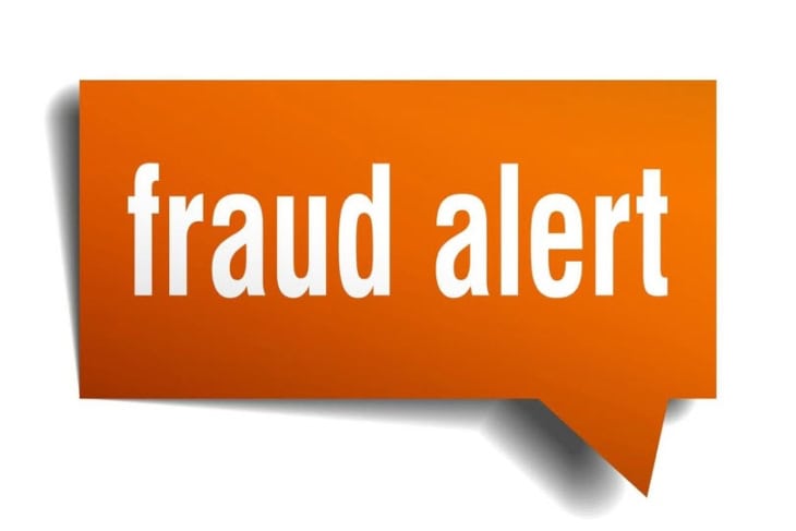 thought bubble with the words "fraud Alert" inside.