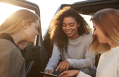 Young women planning road trip