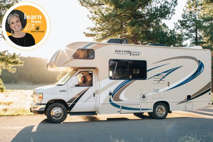 family driving RV down road