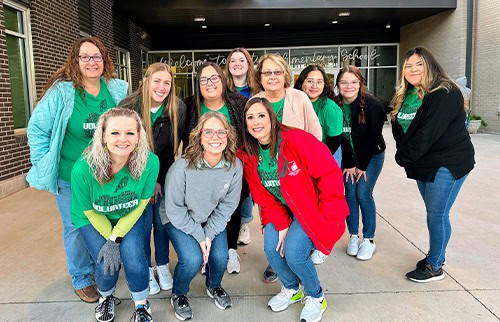 Employees at Austin Elementary for High Five Friday