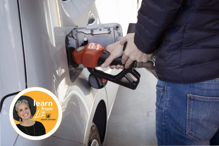 man pumping gas