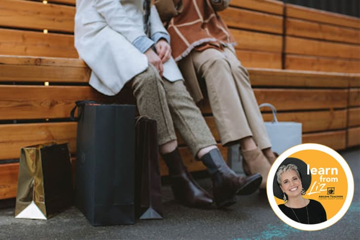 two ladies sitting on bench