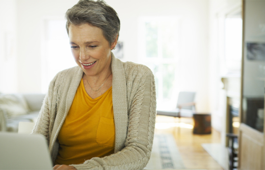 Woman using laptop computer