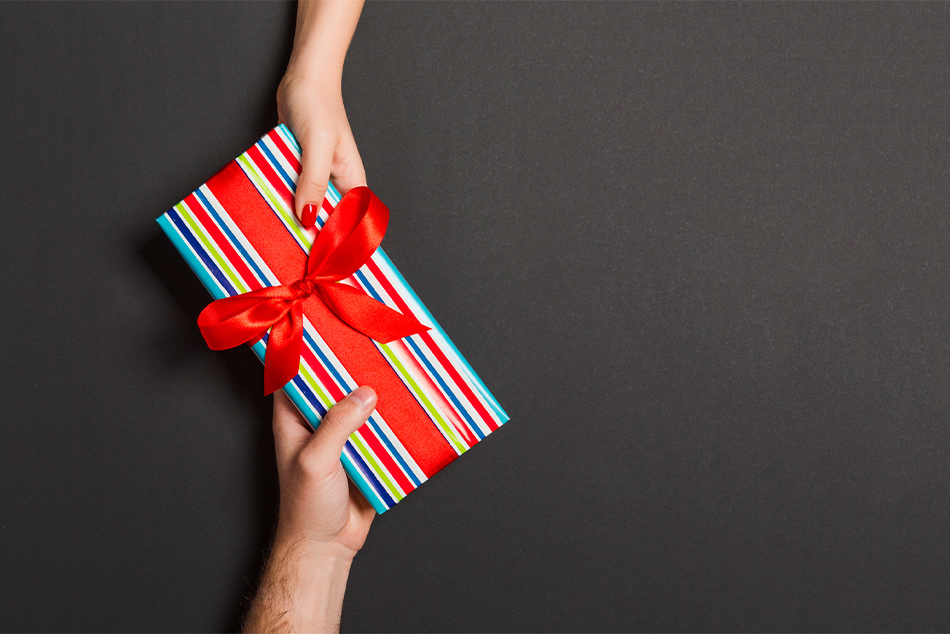 Present being exchanged between hands