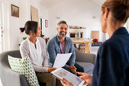 Mature couple meeting with a loan officer