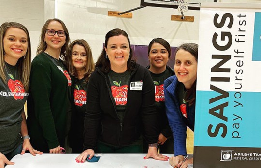 Group photo of ATFCU volunteers at Economic Reality Fair