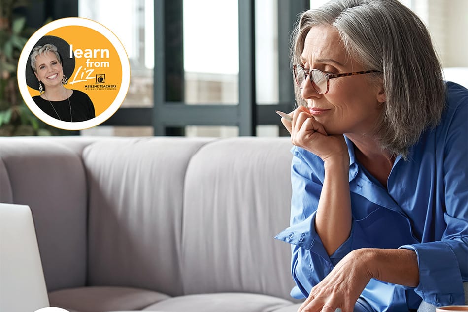 Senior Woman looking at laptop