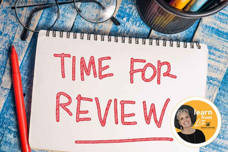 notepad with 'time for review' written on it