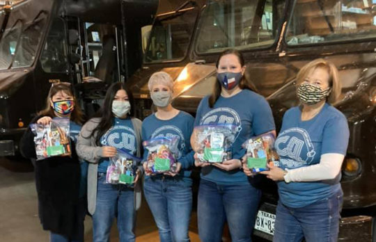 ATFCU Volunteers delivering goodies to UPS drivers