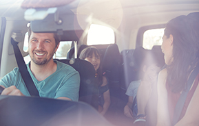 family in car