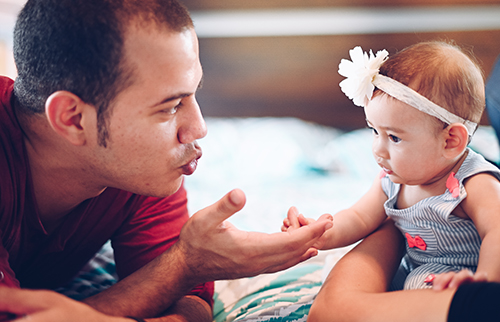 father with newborn