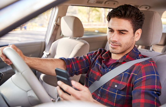 man browsing mobile device