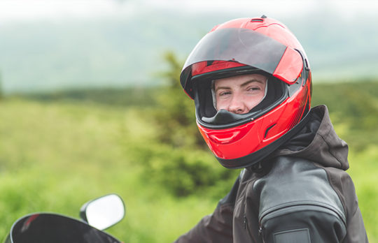 man on motorcycle helmet