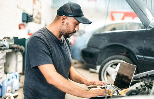 mechanic testing car