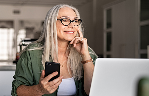 middle aged woman with iphone