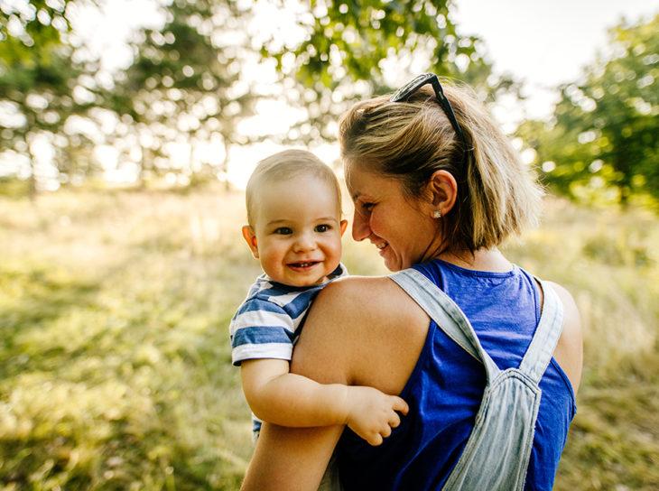 mother on nature walks with child