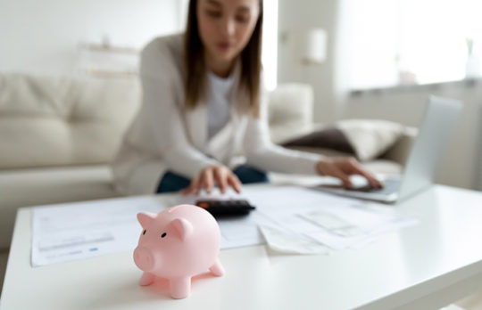 piggy bank and computer