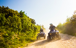 riding atv on dirt road