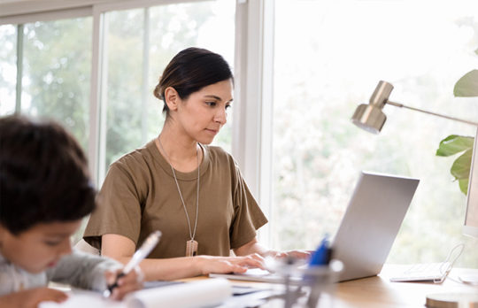 woman and child at desk