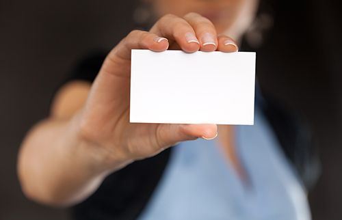 woman holding coupon book