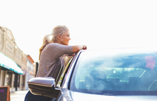 woman relaxing in car