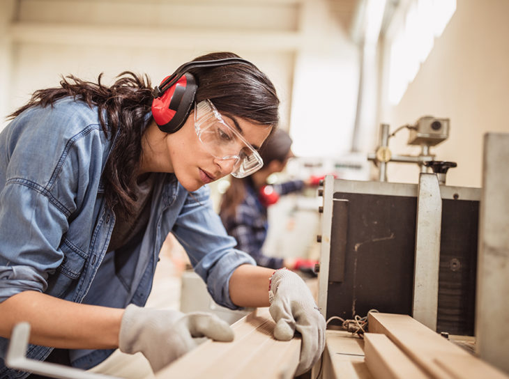 woman woodworking in shop